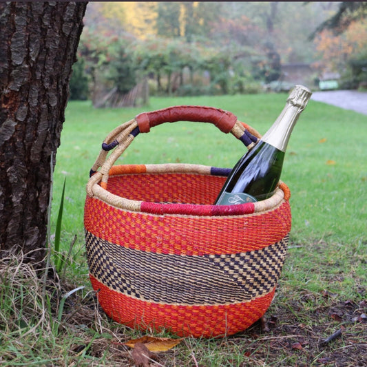 Colourful handmade Bolga storage basket from Ghana